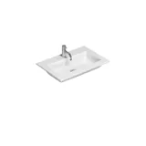 Small, stylish bathroom with dark blue walls, soft yellow bathroom furniture with grooves, and an elegant round mirror with lamp