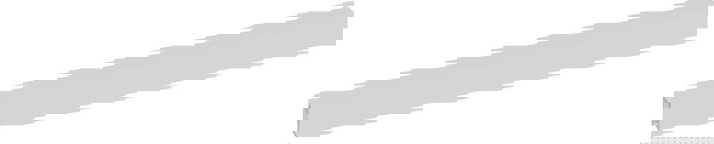 Nordic style bathroom inspiration with vanity unit and base cabinets in smoked oak, makeup area, side-mounted sink, round mirror with brass frame, and visible charming wooden beams.