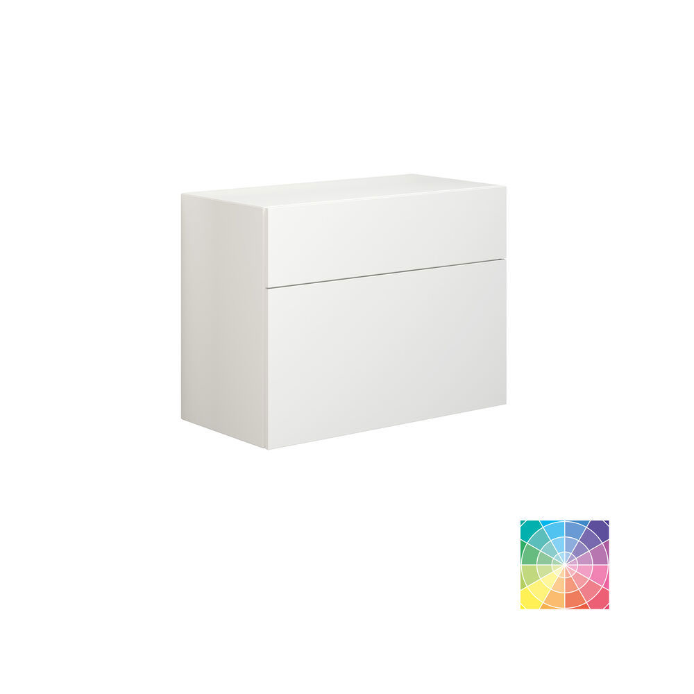 Elegant and modern bathroom inspiration with slanted ceiling, wall-mounted blue vanity unit and base cabinets, round sink with brass faucet, illuminated mirror, and natural light