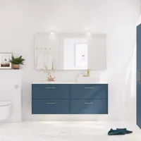 Bathroom inspiration with bathroom furniture in modern blue colour, elegant countertop basin and large square mirror with light, white herringbone tiles create a stylish and classic look