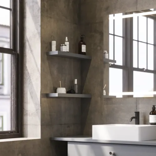 Bathroom inspiration with sloped walls inspiration, grey vanity unit and upper cabinet, custom-made countertops, modern square countertop basin, square mirror with lights, raw concrete walls and floors create an urban look
