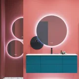 Large bathroom inspiration with blue special color grooved furniture, thin elegant sink, and beautiful round mirrors, red walls, and terrazzo floor create a strong contrast to the furniture, giving a stylish and urban look.