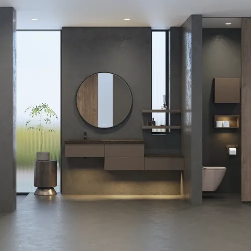 Stylish and spacious bathroom inspiration with a large round mirror with a black frame, dark stone sink, colored toilet, upper cabinet, and open shelf in a sophisticated and muted design