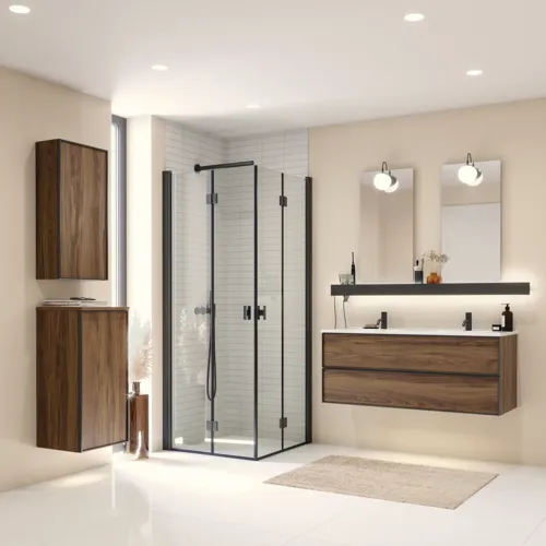 Large bathroom inspiration with brown oak furniture, black frame fronts, double sink, black shelf, rounded mirrors, black corner shower with folding doors, white tiles, and beige walls for a modern look