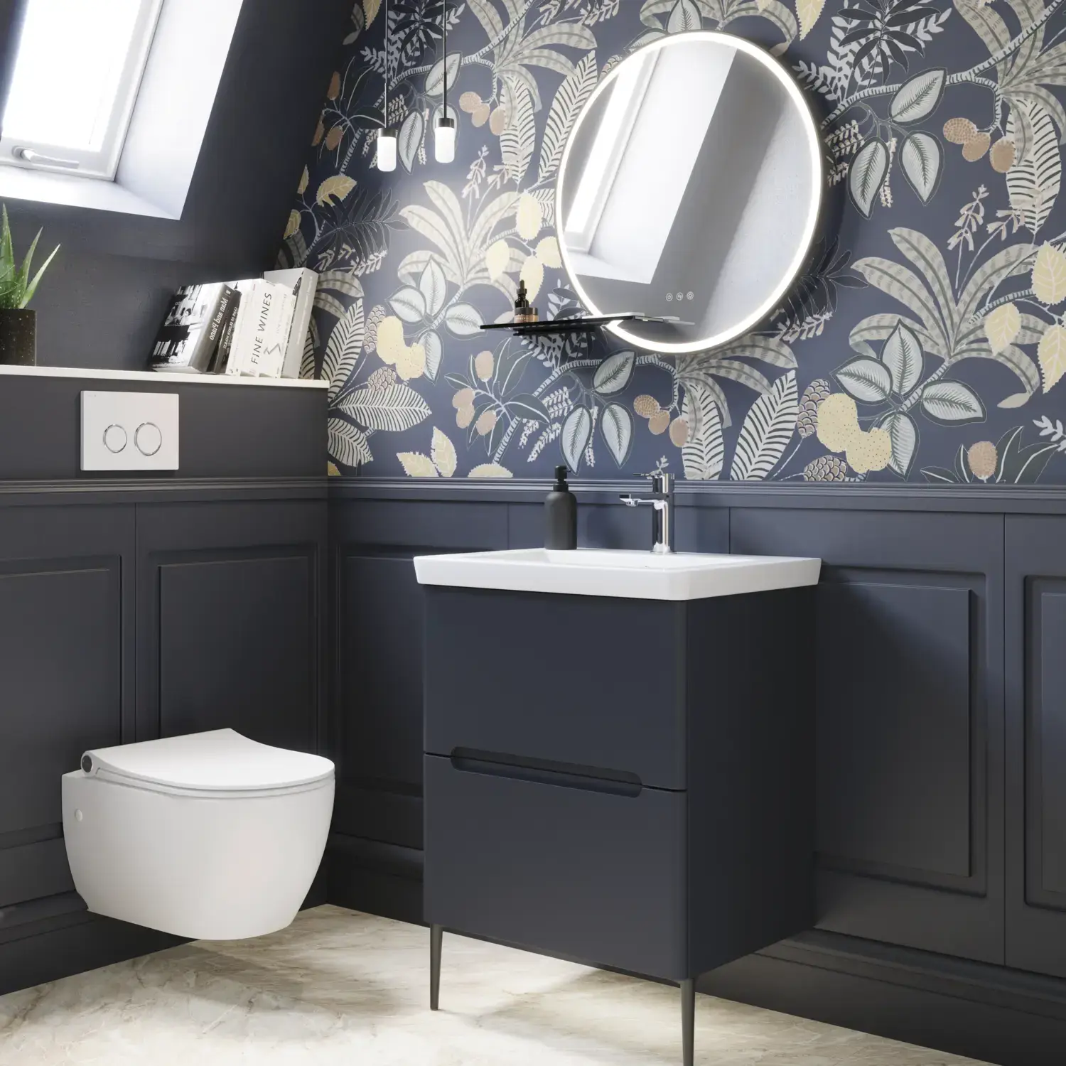 Bathroom inspiration with dark blue wall panels, romantic floral wallpaper, dark blue vanity with soft curves, and a beautiful round mirror with light, creating a vintage look