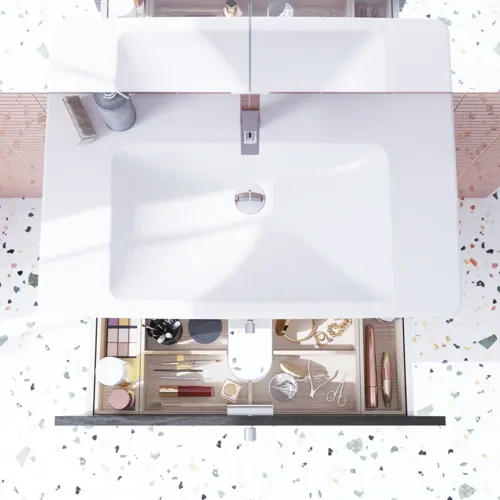 Bathroom inspiration with an elegant sink and a vanity unit with practical and stylish drawer organization in the form of beautiful wooden boxes, providing optimal space utilization.