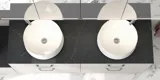 Romantic bathroom inspiration with mirror cabinet offering practical and graceful storage solutions, double countertop sinks on a stone countertop.