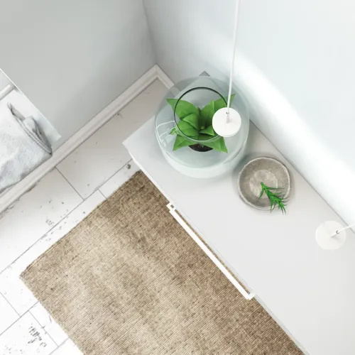 Large and romantic bathroom with brass framed round mirror