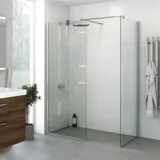 Large bathroom inspiration with a vanity unit with deep drawer in brown oak, beautiful double sink, elegant mirror cabinet with integrated light and walk-in shower with satin details, large light tiles create a bright and modern look.