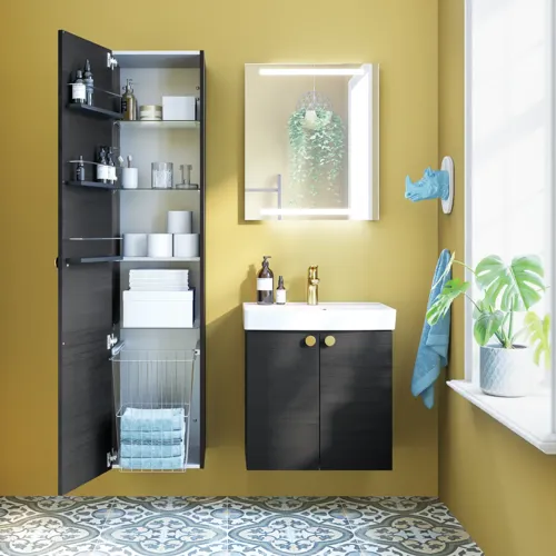 Small bathroom inspiration with bathroom furniture in black structure with elegant washbasin, practical and stylish decor and round brass handles, square mirror with integrated light for a modern look.