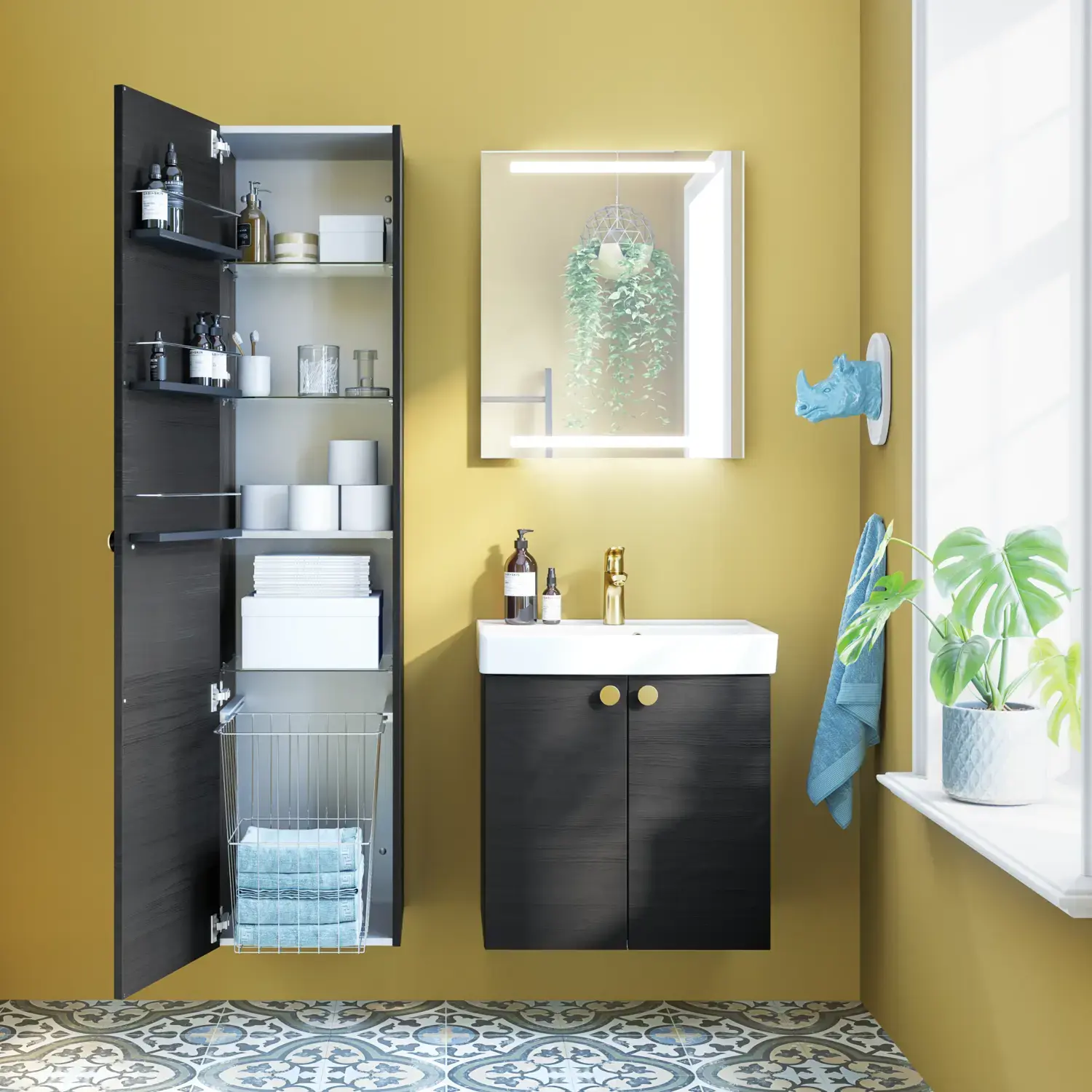 Small bathroom inspiration with bathroom furniture in black structure with elegant washbasin, practical and stylish decor and round brass handles, square mirror with integrated light for a modern look.
