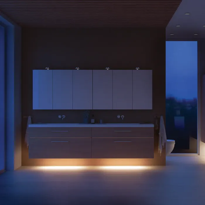 Modern bathroom in Nordic style with light wood, elegant lighting, mirror cabinet wall, and stylish decor, creating a warm and inviting atmosphere.