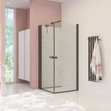 Large bathroom inspiration with white bathroom furniture, square mirror, and shower screen with swing doors with clear glass and profiles in matt black, as well as an elegant electric heated towel rail.