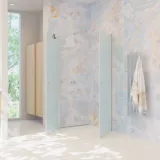 Large bathroom inspiration with bathroom furniture in light wood, square mirror, and shower screen with hinged doors with ice glass and profiles in satin and elegant electric heated towel rail.