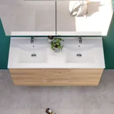 Large bathroom inspiration with a vanity unit in Warm Oak, elegant double sink, beautiful mirror cabinet and shower screen, green herringbone tiles for a sophisticated look.