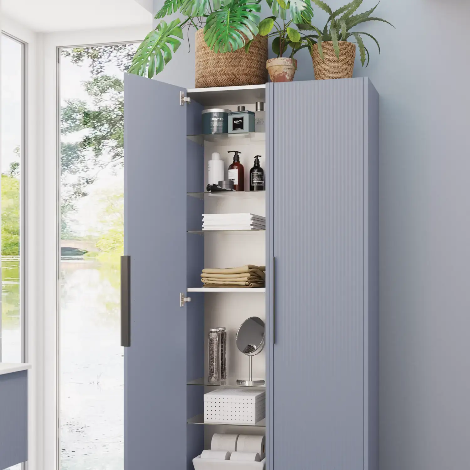 Bathroom inspiration with a double tall cabinet in light blue with beautiful narrow stripes, modern black handles, and five movable glass shelves that together add elegance and practicality to your bathroom.