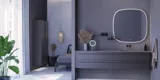 Large bathroom inspiration with grey vanity unit with integrated handle, stylish side-mounted sink, square mirror with rounded corners, concrete-look walls and raw materials for an urban look