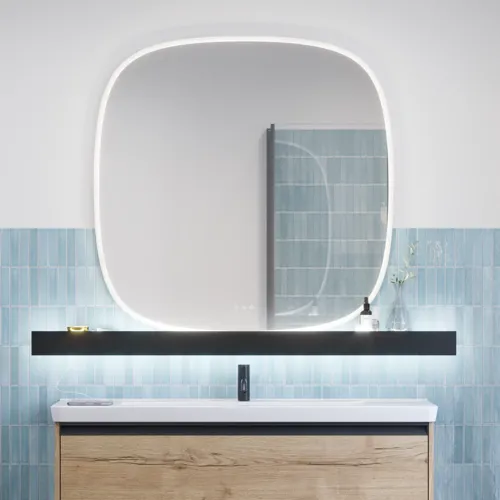 Bathroom inspiration with elongated blue tiles, natural oak bathroom furniture with black details, creating a harmonious and sophisticated look