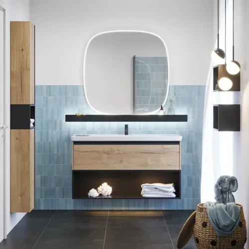Bathroom inspiration with elongated blue tiles, natural oak bathroom furniture with black details, creating a harmonious and sophisticated look