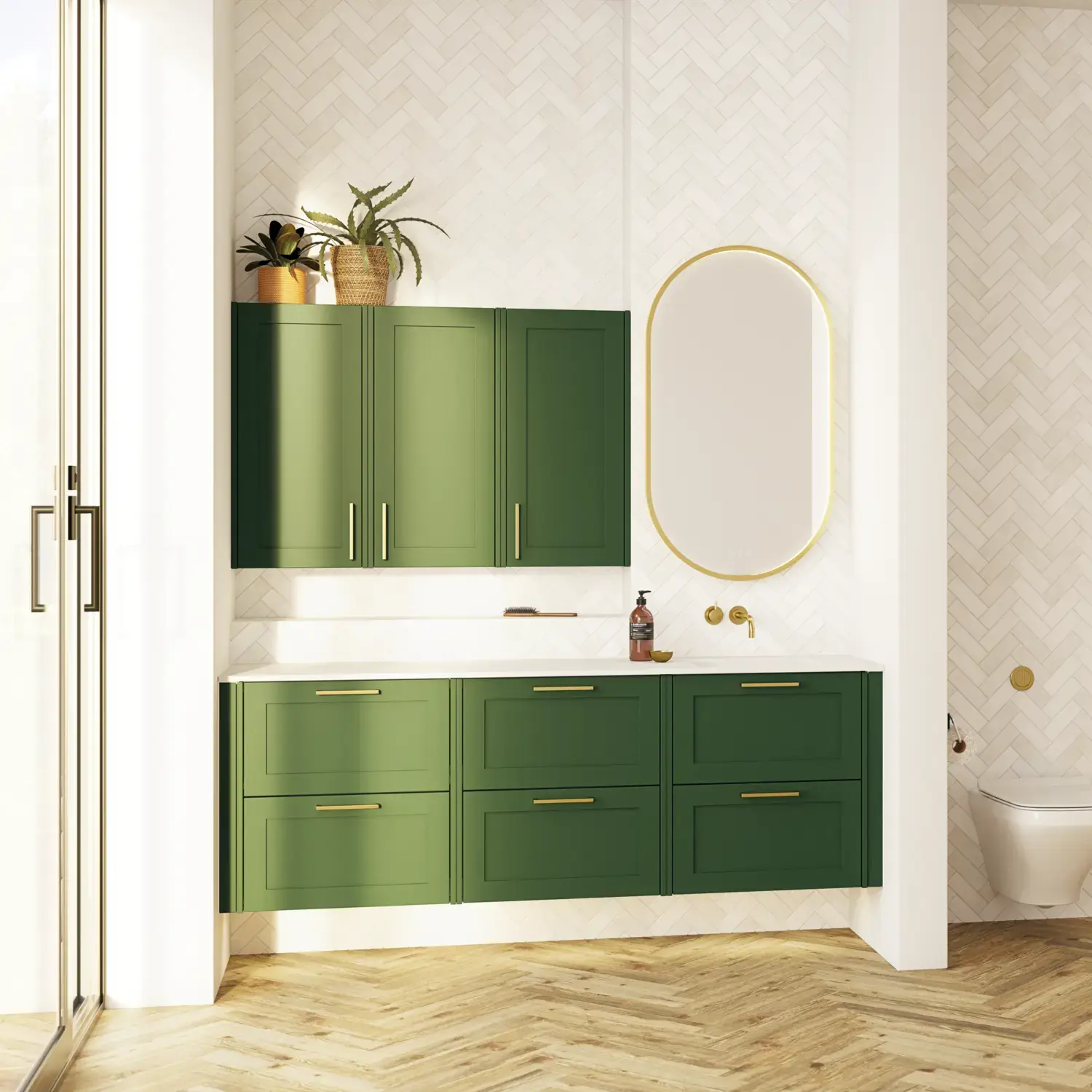 Large bathroom in green colors with vanity unit, brass framed oval mirror and beautiful framed doors